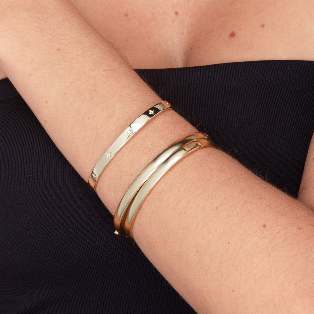 Open cuff bangle stacked with bracelets – Vessaly