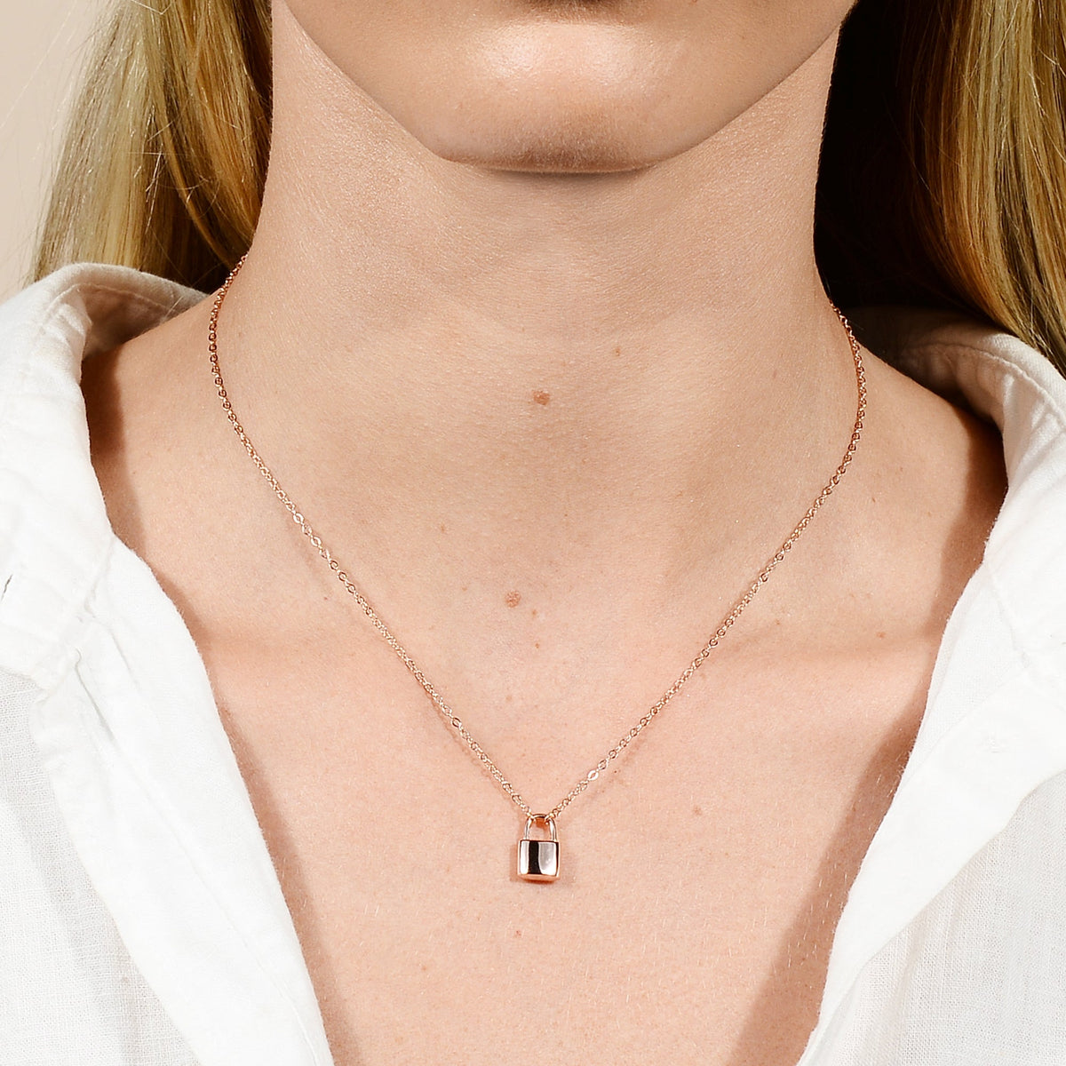 Gold padlock pendant variation M, alphabet detail