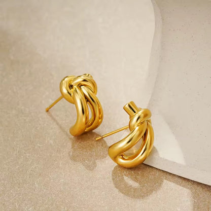 Sterling silver knot huggie hoops, modern jewelry