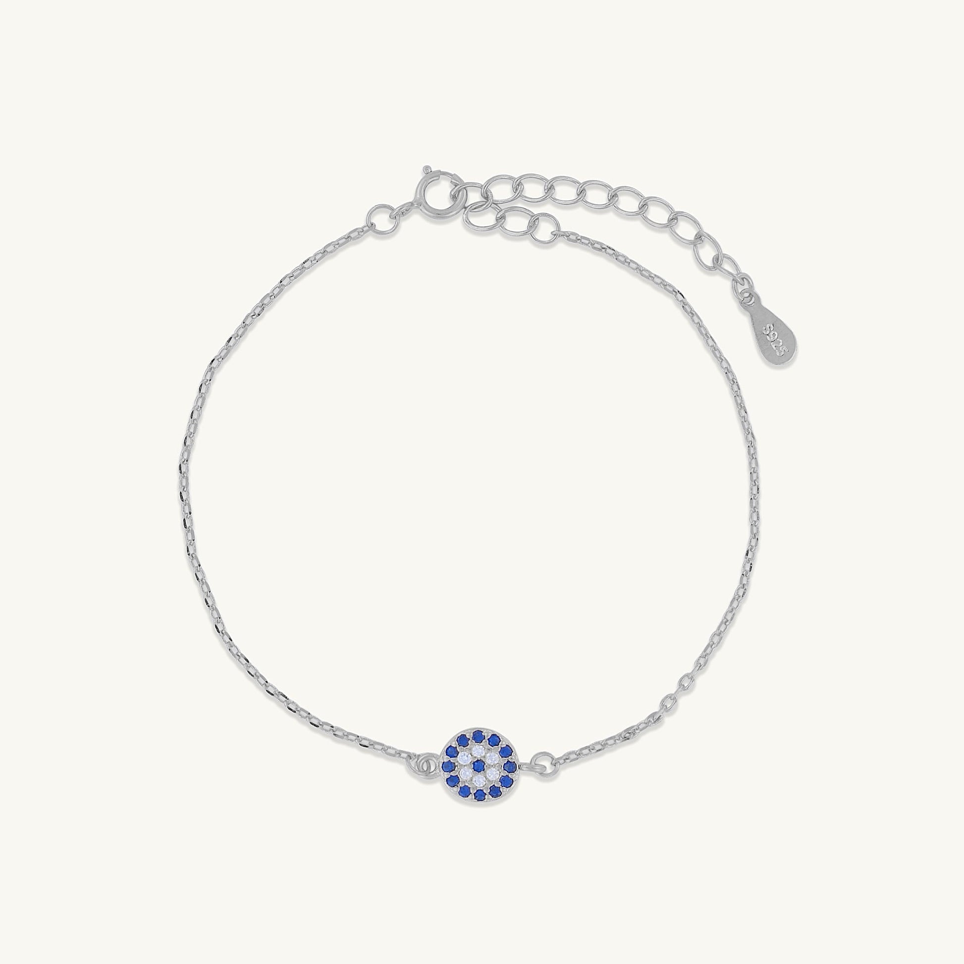 Close-up of pave evil eye charm detail