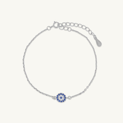 Close-up of pave evil eye charm detail