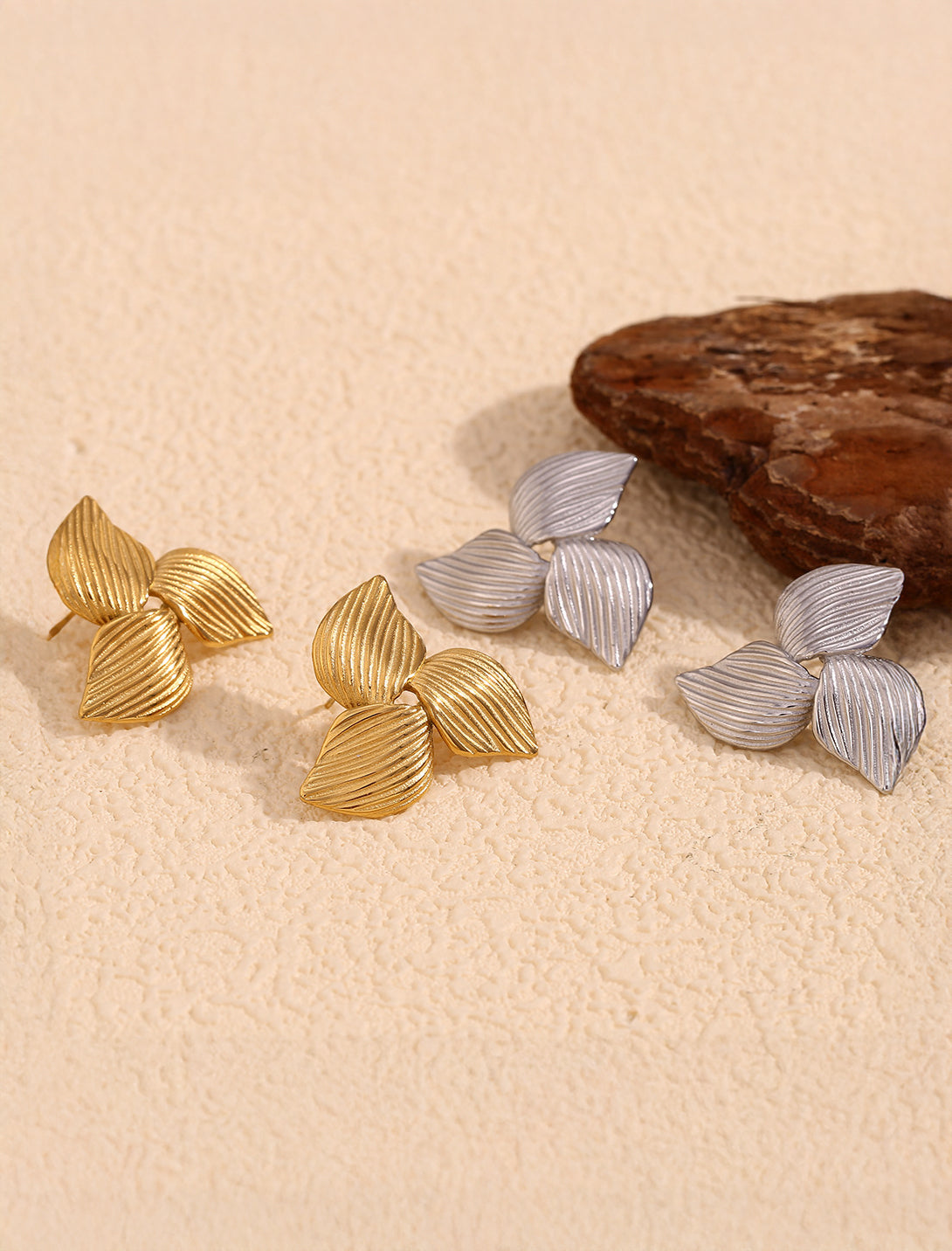Trio bloom earrings detail shot, romantic design