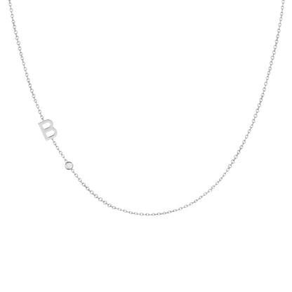 Pavé initial necklace alternative angle showing extender chain