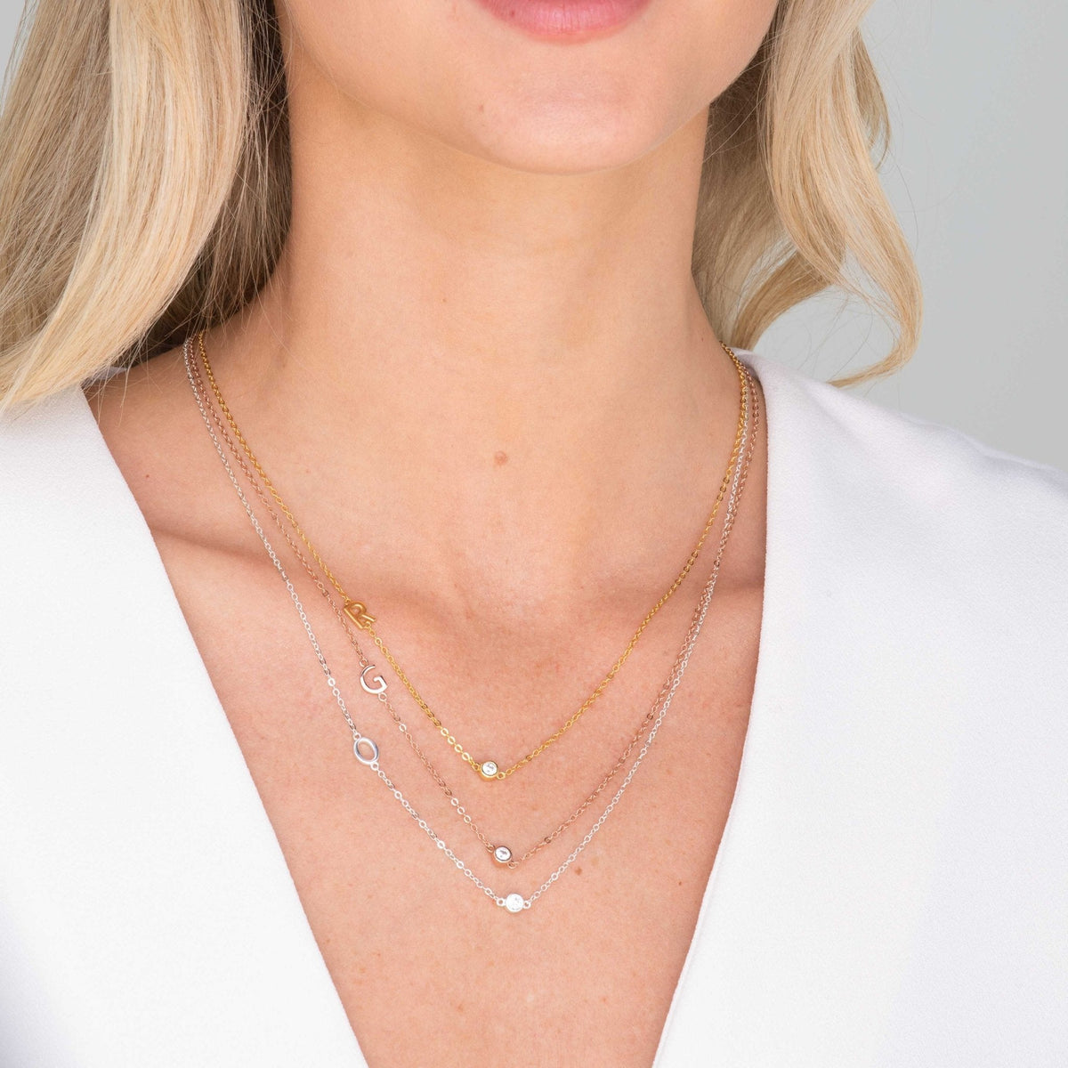 Close-up of pavé initial pendant sparkle – Vessaly