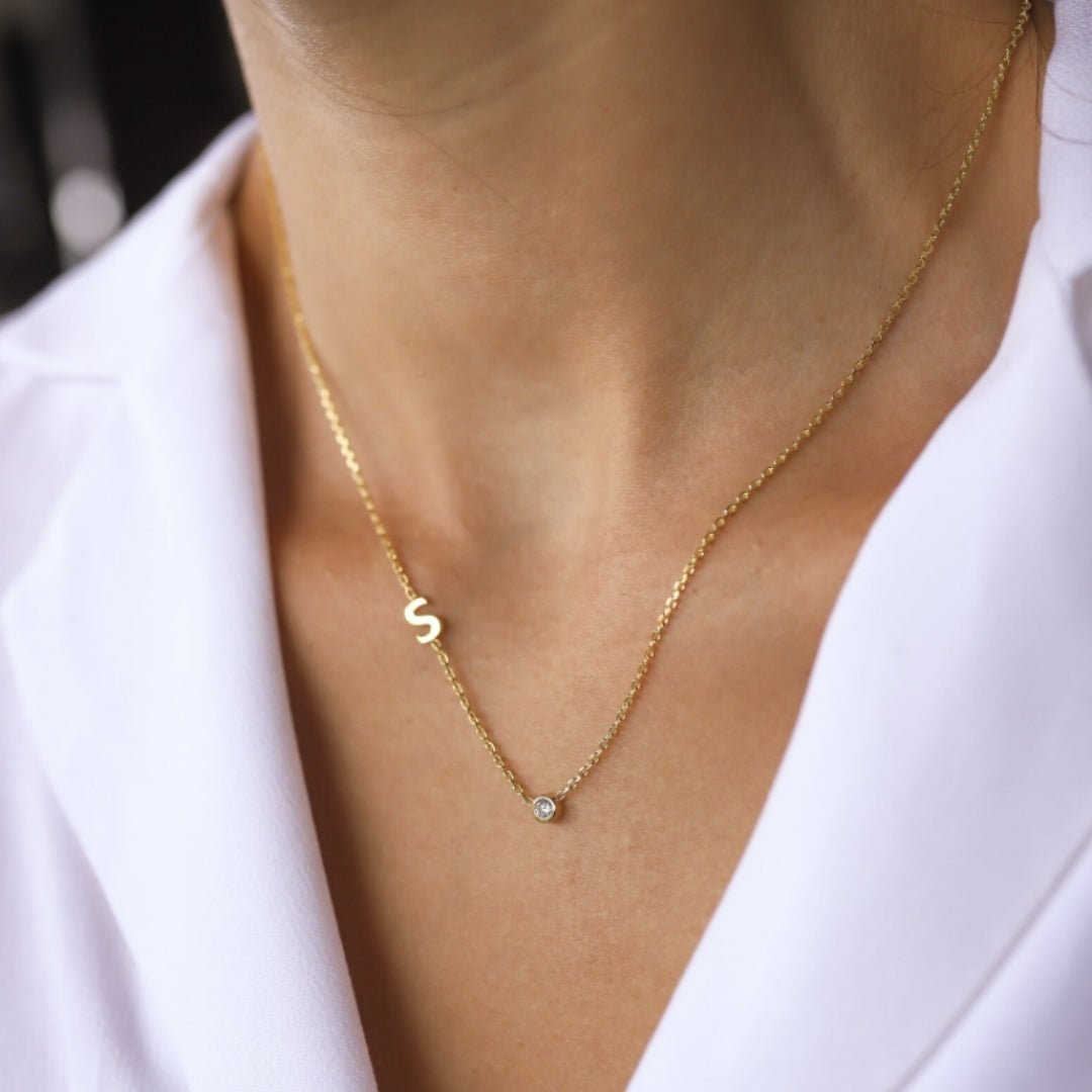 Sideways pavé initial necklace side angle – Vessaly