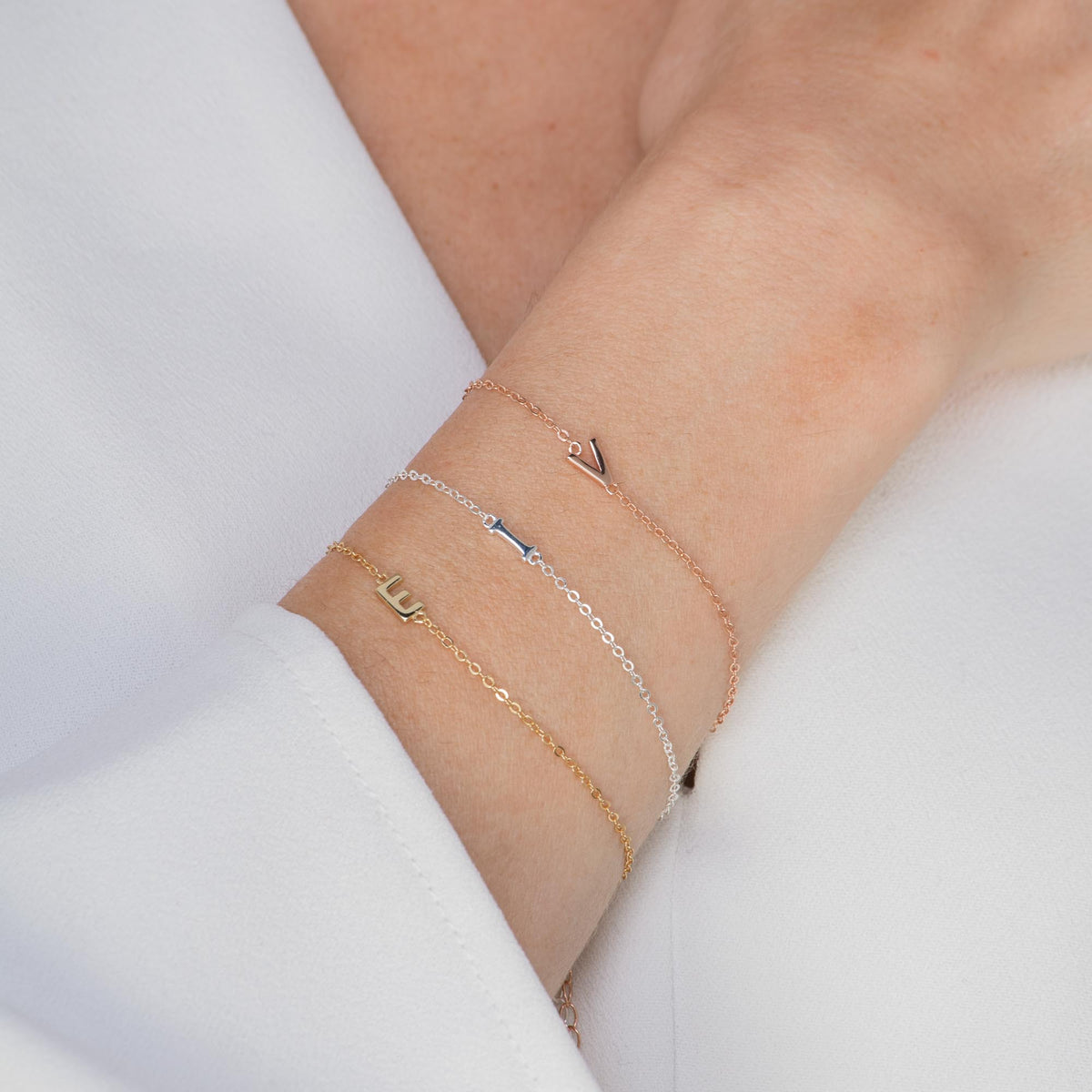 Sideways letter bracelet close-up detail – Vessaly