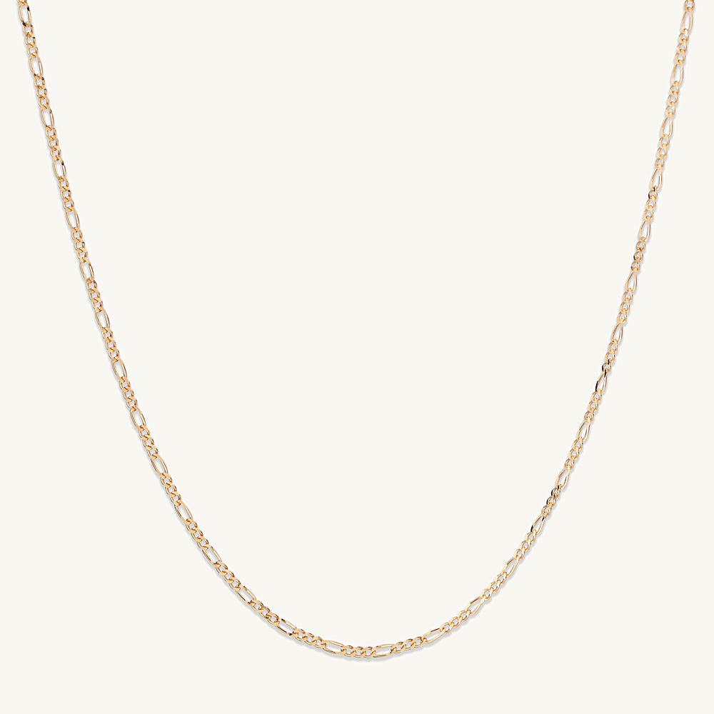 Figaro necklace shown layered with other delicate chains