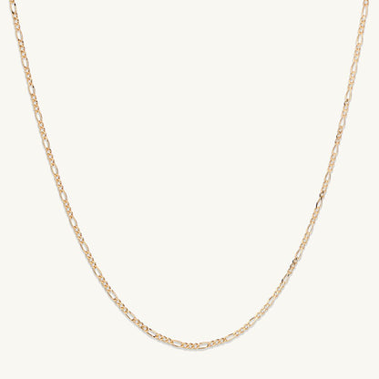 Figaro necklace shown layered with other delicate chains