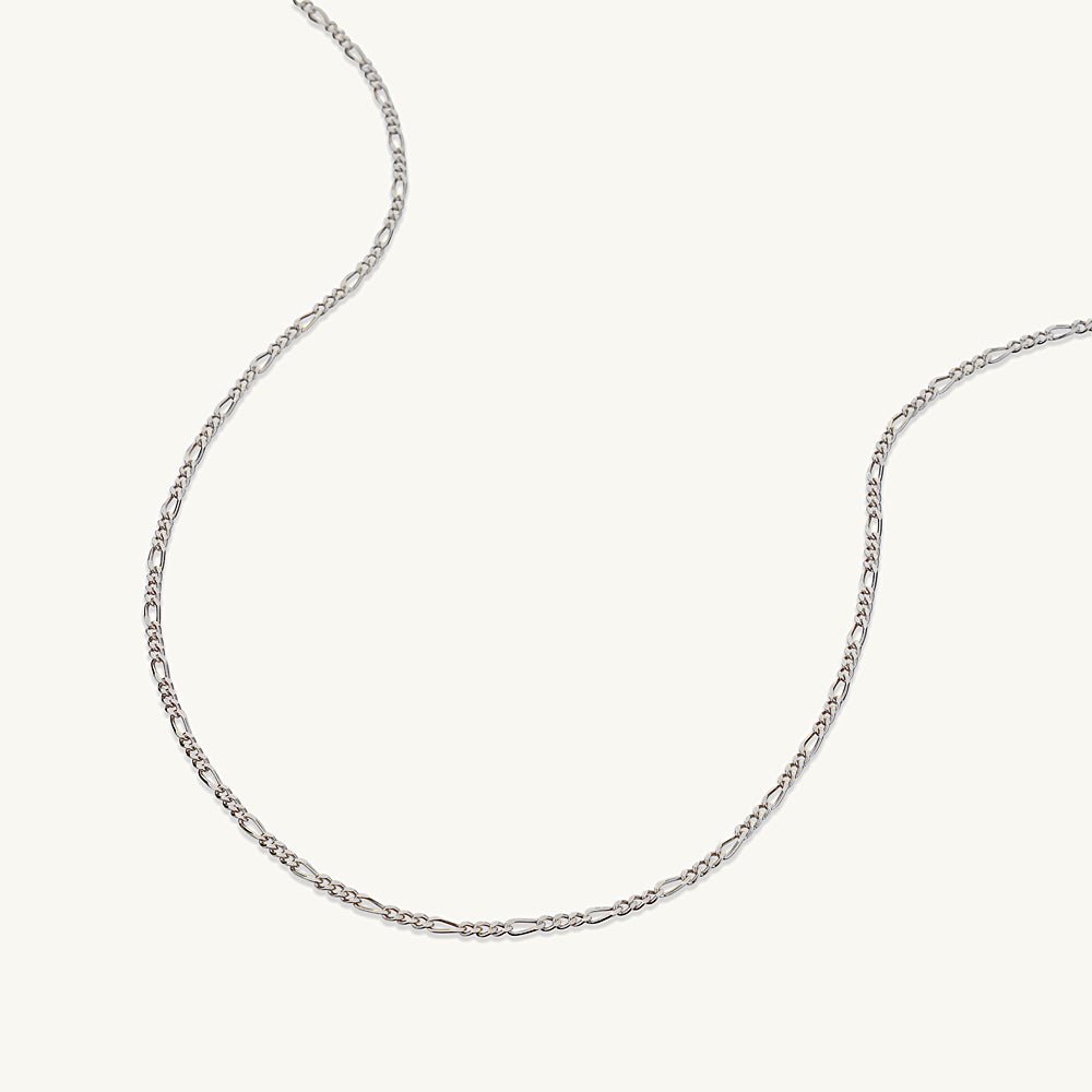 Slim figaro gold chain detail shot