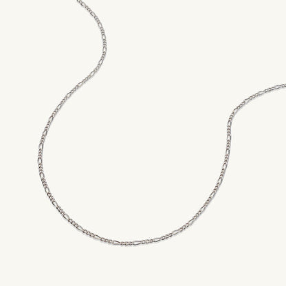 Slim figaro gold chain detail shot