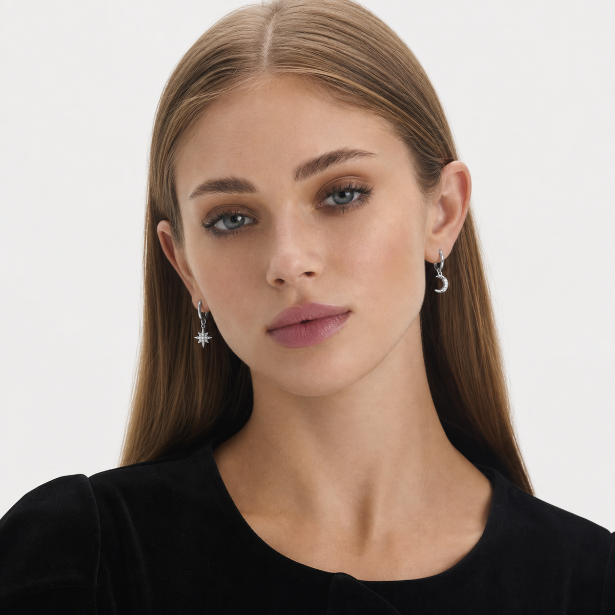 Sterling Silver Star and Moon Earrings worn by model — front view