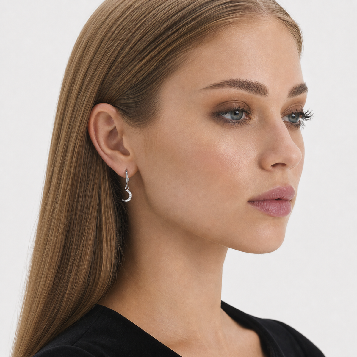 Sterling Silver Moon Earring worn by model — profile view
