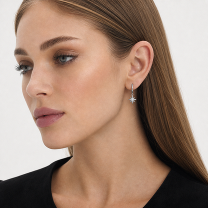 Sterling Silver Star Earring worn by model — profile view