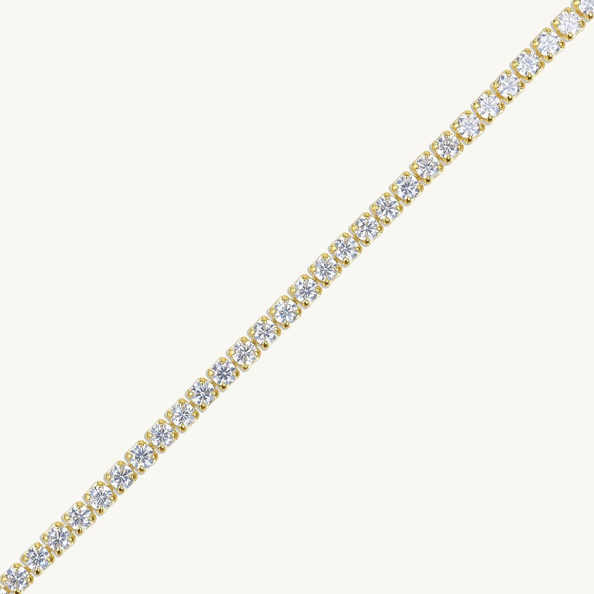 Tennis bracelet with secure clasp, sapphire detail