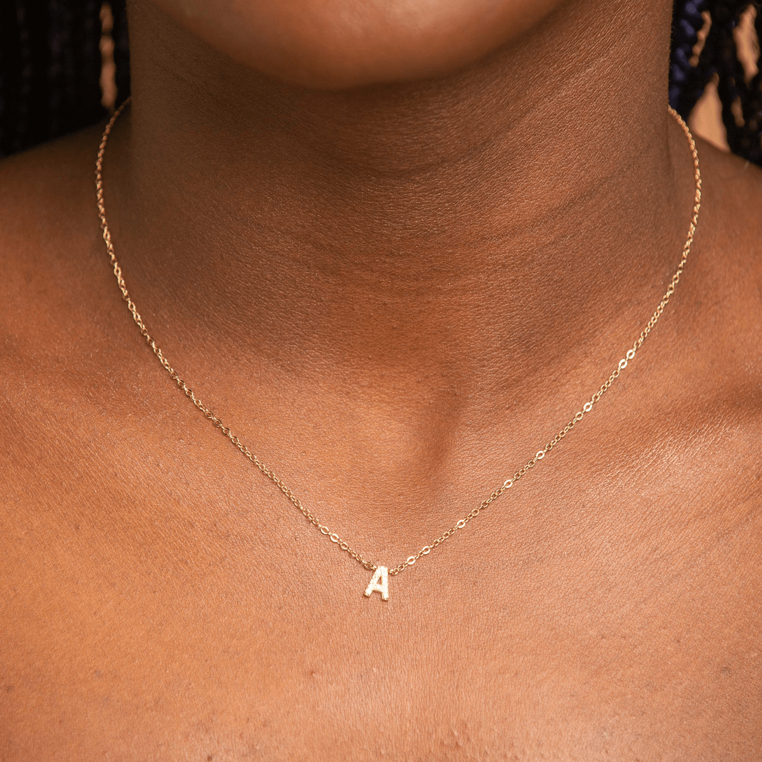 Sapphire initial necklace side angle – Vessaly