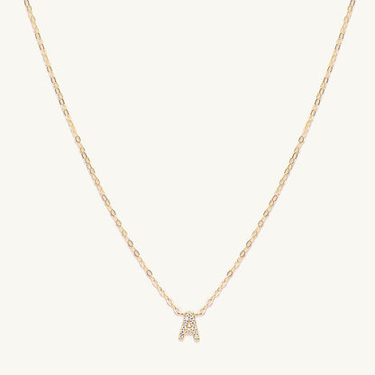 Sapphire letter necklace variation H on a delicate gold chain