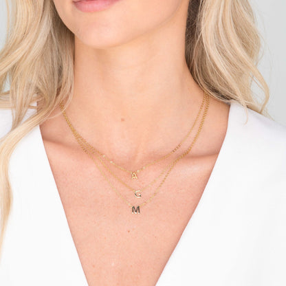 Personalised gold letter necklace detail