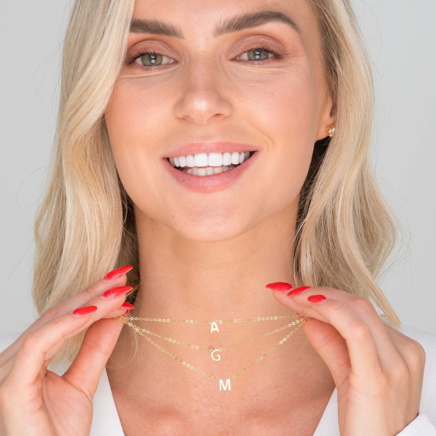18K gold vermeil letter necklace styled on a model