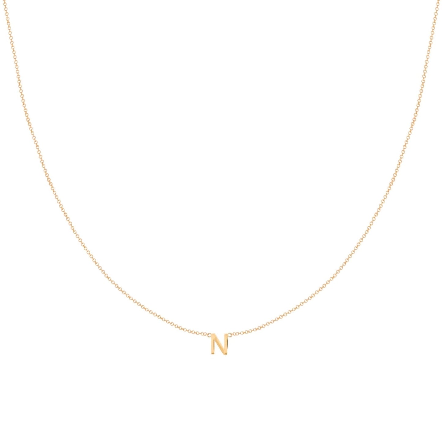Letter necklace shown with extender chain