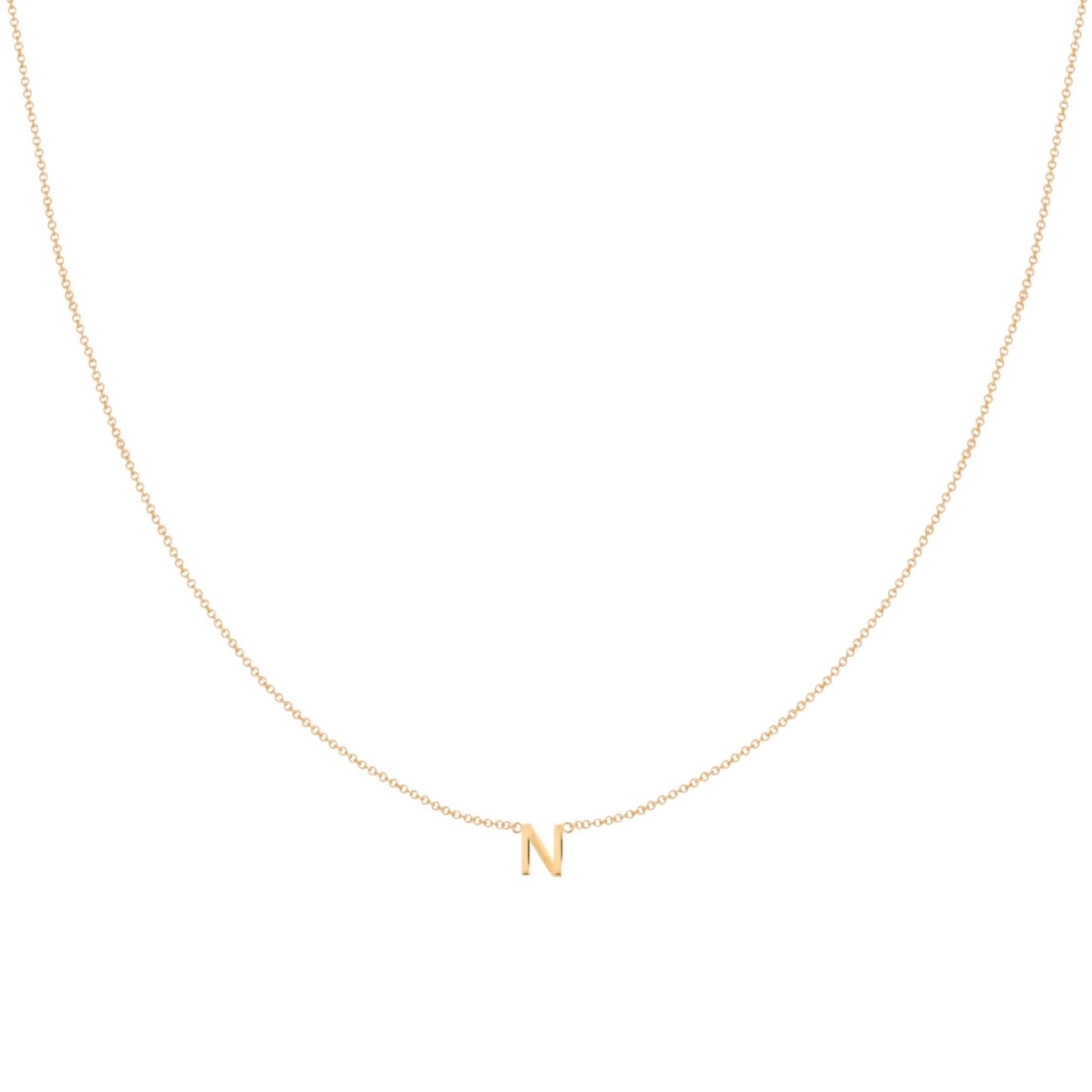 Letter necklace shown with extender chain