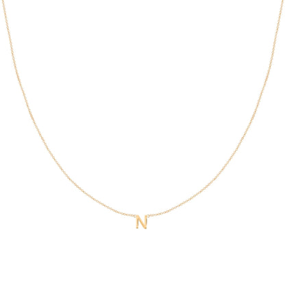 Letter necklace shown with extender chain