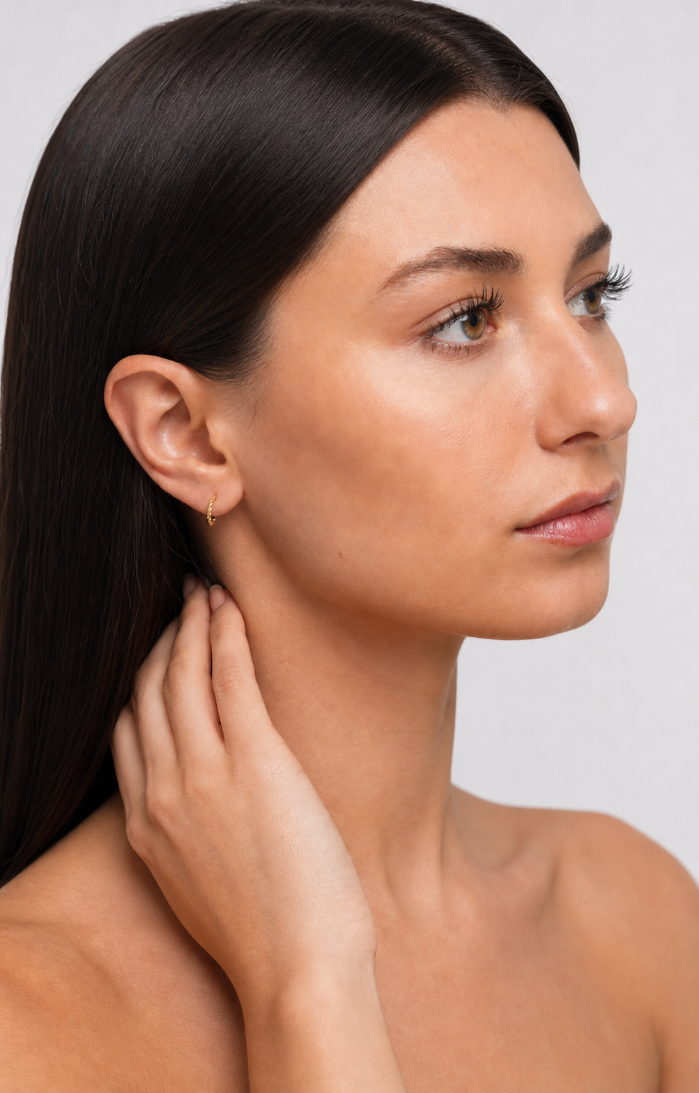 Small 14K Gold-Plated Thin Hoop Earrings worn by model profile view