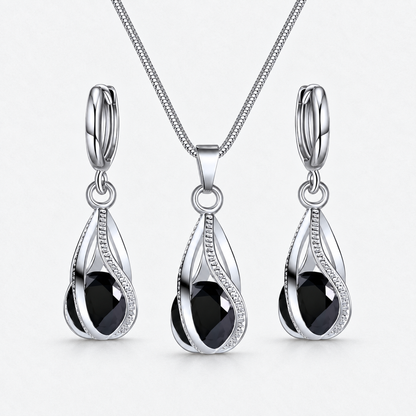 Black Crystal Twist Necklace & Earring Set in Black, product view on a white background - Vessaly