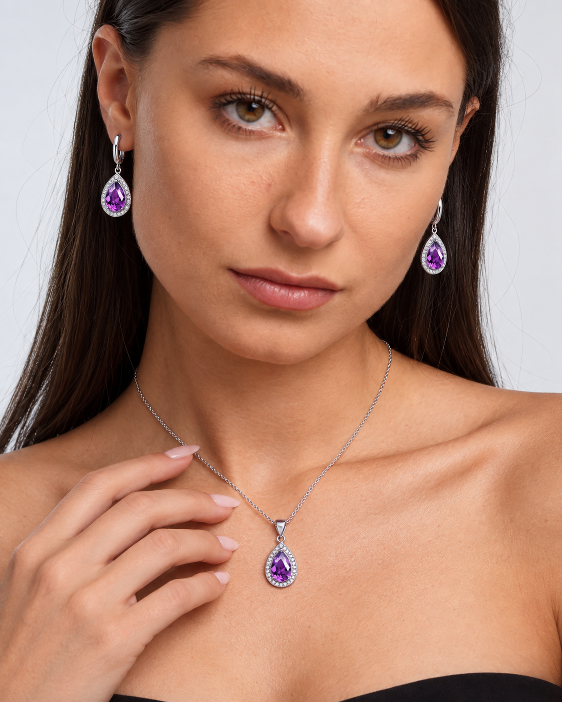 Color Crystal Teardrop Necklace & Earring Set in Purple, worn by a model in a close-up - Vessaly