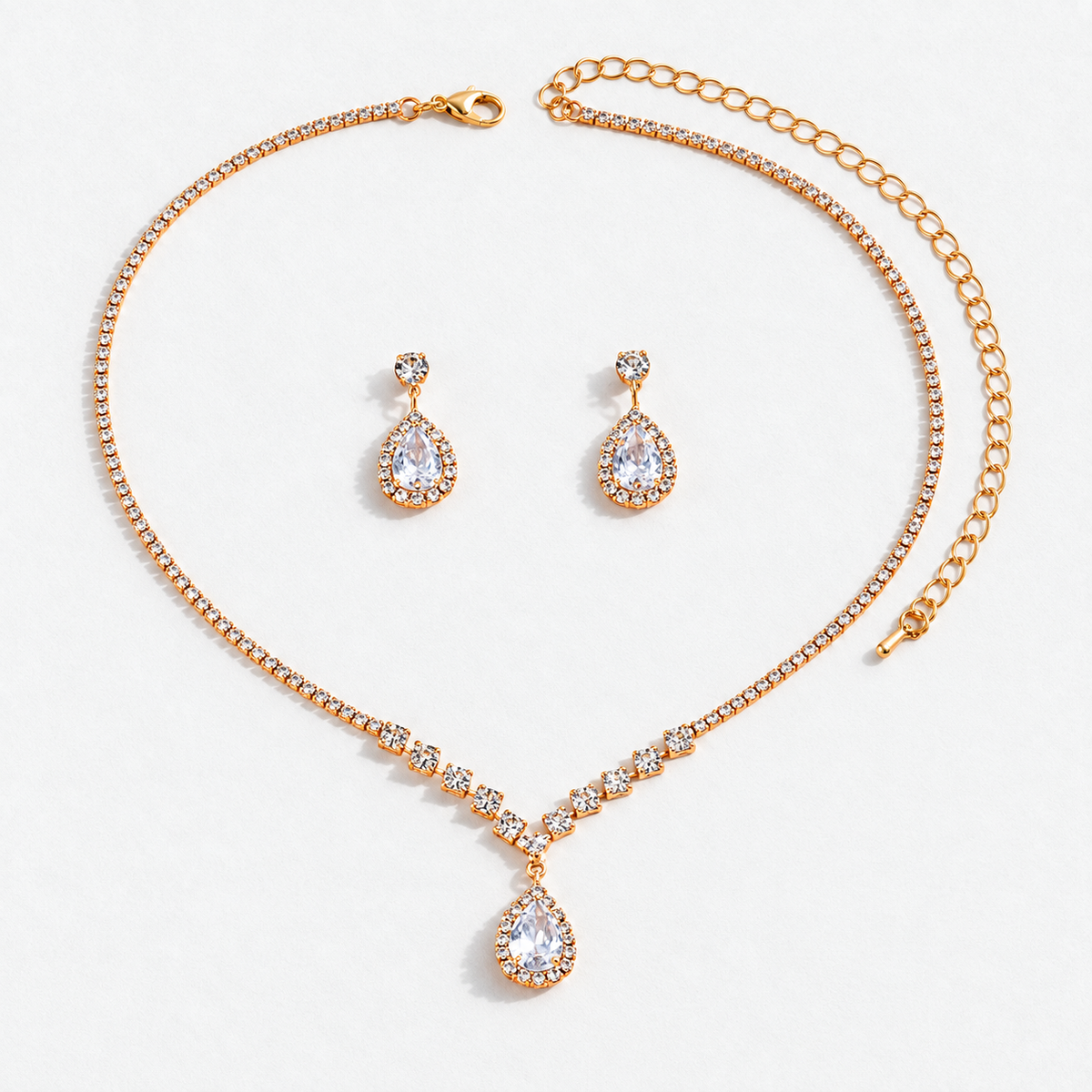 Crystal Teardrop Necklace & Earring Set in Gold / Clear, product view on a white background - Vessaly