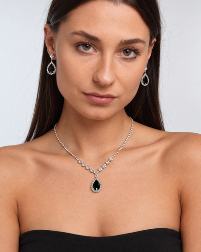 Crystal Teardrop Necklace & Earring Set in Silver / Black, worn by a model in a front portrait - Vessaly