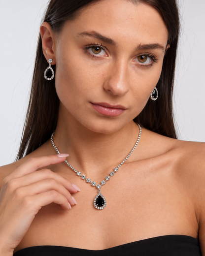 Crystal Teardrop Necklace & Earring Set in Silver / Black, worn by a model in a close-up - Vessaly