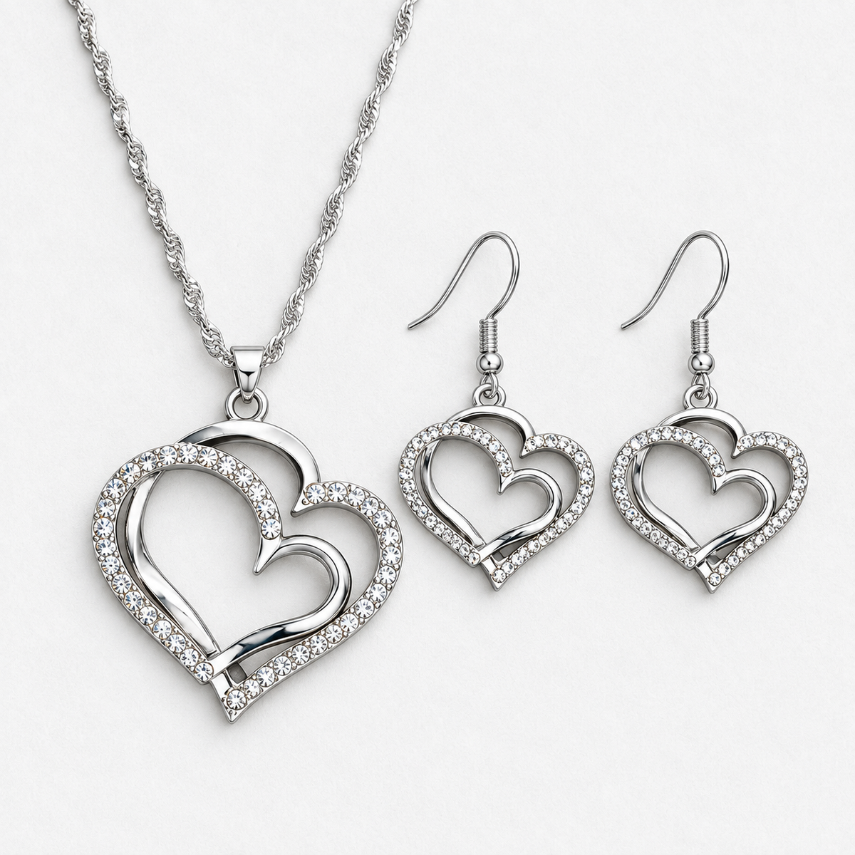 Double Heart Crystal Necklace & Earring Set in Silver, product view on a white background - Vessaly