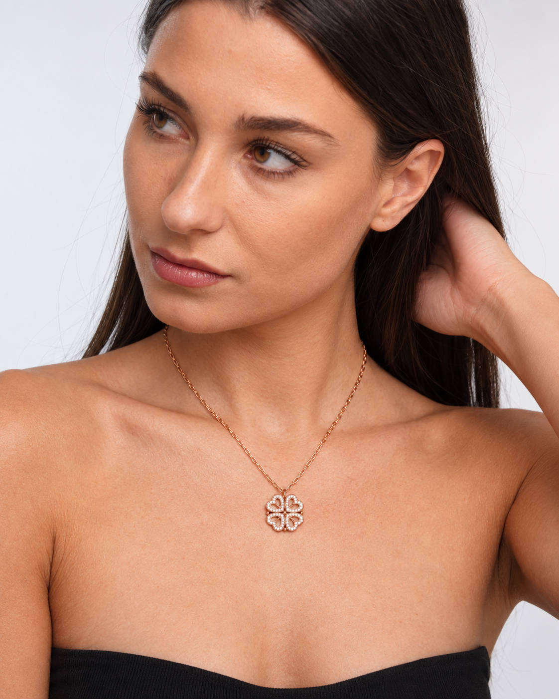 Model wearing Clover Heart Locket Necklace — rose-gold — view 2
