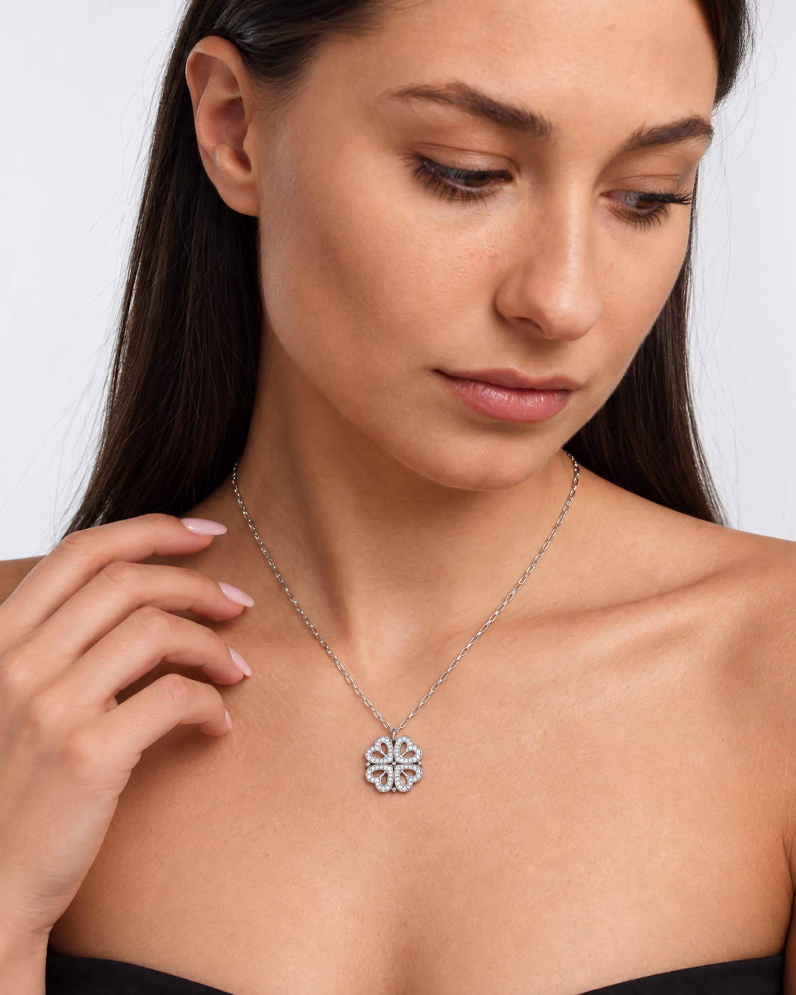 Model wearing Clover Heart Locket Necklace — silver — view 2