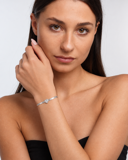 Model wearing Snake Chain Herringbone Bracelet — view 1