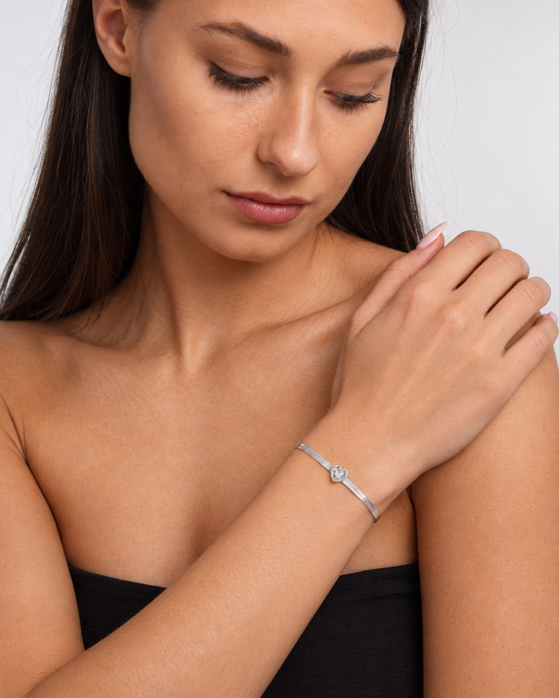 Model wearing Snake Chain Herringbone Bracelet — view 2