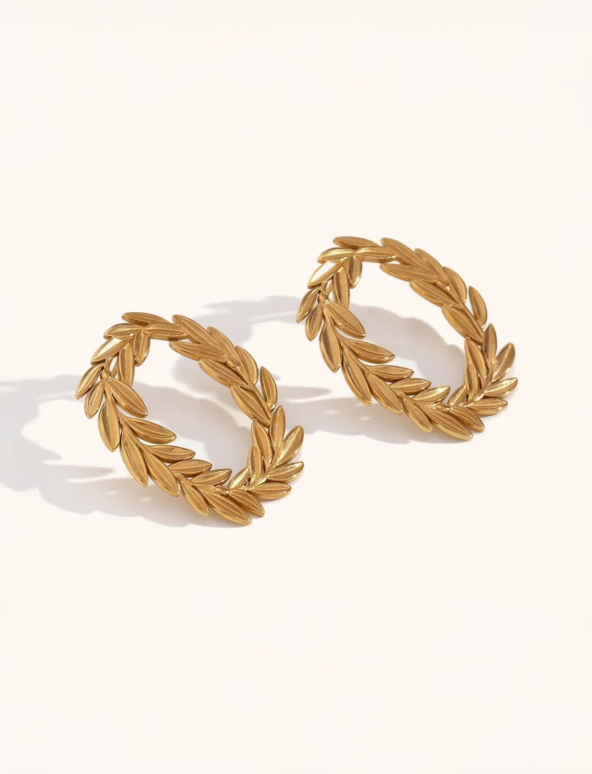 Sculptural gold statement earrings pair – Vessaly